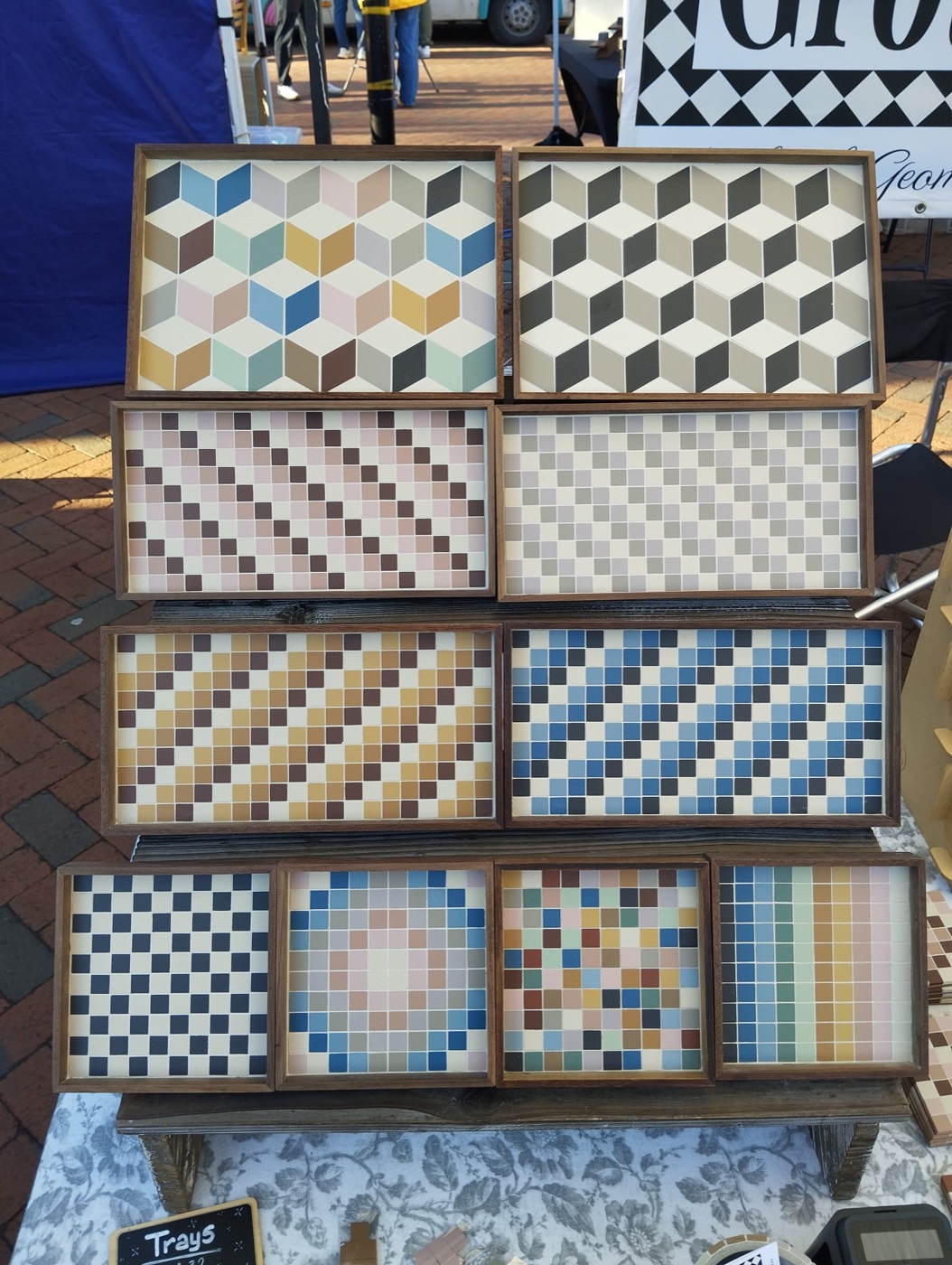 Mosaic trays stacked on the stall